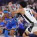 Shai Gilgeous-Alexander #2 of the Oklahoma City Thunder drives around Dylan Harper #2 of the San Antonio Spurs during the first quarter in Game Two of the NBA Western Conference Finals (Photo by Alex Slitz/Getty Images)