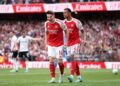 Viktor Gyoekeres of Arsenal celebrates scoring his team's first goal with teammate Gabriel during the Premier League match between Arsenal and Fulham (Photo by Warren Little/Getty Images)