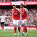 Viktor Gyoekeres of Arsenal celebrates scoring his team's first goal with teammate Gabriel during the Premier League match between Arsenal and Fulham (Photo by Warren Little/Getty Images)