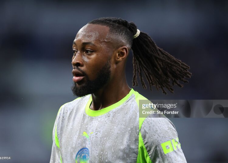 Manchester City player Antoine Semenyo looks on wearing the grey Puma away strip during the Premier League match between Everton and Manchester City (Photo by Stu Forster/Getty Images)