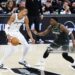Victor Wembanyama #1 of the San Antonio Spurs handles the ball while defended by Anthony Edwards #5 of the Minnesota Timberwolves during the game during Round Two Game Two (Photos by David Sherman/NBAE via Getty Images)