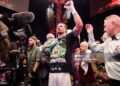 Oleksandr Usyk celebrates after beating Rico Verhoeven in their WBC World Heavyweight  Title during the Glory in Giza - Fight Night at The Pyramids (Photo by Mark Robinson/Getty Images).