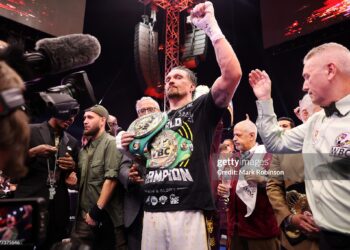 Oleksandr Usyk celebrates after beating Rico Verhoeven in their WBC World Heavyweight  Title during the Glory in Giza - Fight Night at The Pyramids (Photo by Mark Robinson/Getty Images).
