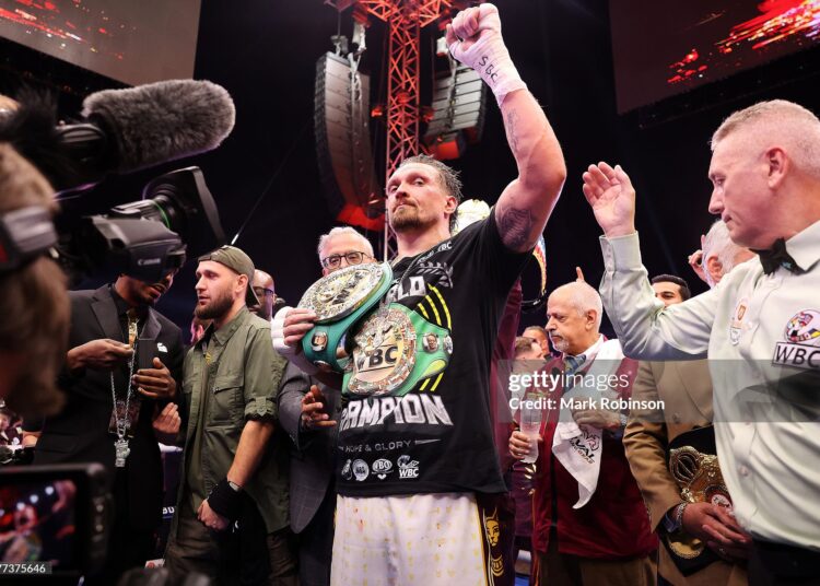 Oleksandr Usyk celebrates after beating Rico Verhoeven in their WBC World Heavyweight  Title during the Glory in Giza - Fight Night at The Pyramids (Photo by Mark Robinson/Getty Images).