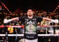 Oleksandr Usyk celebrates after beating Rico Verhoeven in their WBC World Heavyweight  Title during the Glory in Giza - Fight Night (Photo by Mark Robinson/Getty Images).