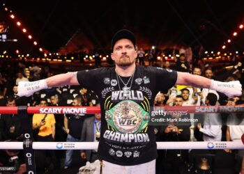 Oleksandr Usyk celebrates after beating Rico Verhoeven in their WBC World Heavyweight  Title during the Glory in Giza - Fight Night (Photo by Mark Robinson/Getty Images).