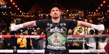 Oleksandr Usyk celebrates after beating Rico Verhoeven in their WBC World Heavyweight  Title during the Glory in Giza - Fight Night (Photo by Mark Robinson/Getty Images).