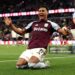 Ollie Watkins of Aston Villa celebrates scoring his team's third goal during the Premier League match between Aston Villa and Liverpool (Photo by Neville Williams/Aston Villa FC via Getty Images)