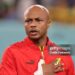 Andre Ayew of Ghana reacts during the line up for the National anthems prior to kick off in the FIFA World Cup Qatar 2022 Group H match between Ghana and Uruguay at Al Janoub Stadium on December 02, 2022 in Al Wakrah, Qatar. (Photo by Youssef Loulidi/Fantasista/Getty Images)