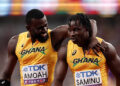 Joseph Paul Amoah embraces teammate Abdul-Rasheed Saminu following the Men's 4x100m Relay Heats on day eight of the World Athletics Championships Tokyo 2025 at National Stadium on September 20, 2025 in Tokyo, Japan. Photo by Christian Petersen/Getty Images