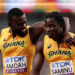Joseph Paul Amoah embraces teammate Abdul-Rasheed Saminu following the Men's 4x100m Relay Heats on day eight of the World Athletics Championships Tokyo 2025 at National Stadium on September 20, 2025 in Tokyo, Japan. Photo by Christian Petersen/Getty Images