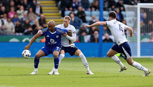 Leicester City's Jordan Ayew shields the ball from Preston North End's Lewis Gibson with Ben Whiteman close by
during the Sky Bet Championship match between Leicester City and Preston North End at The King Power Stadium on April 3, 2026 in Leicester, United Kingdom. Photo by Lee Parker - CameraSport via Getty Images
