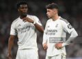 Aurelien Tchouameni and Federico Valverde of Real Madrid look on during the LaLiga EA Sports match between Real Madrid CF and Girona FC (Photo by Denis Doyle/Getty Images)