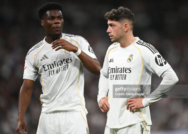 Aurelien Tchouameni and Federico Valverde of Real Madrid look on during the LaLiga EA Sports match between Real Madrid CF and Girona FC (Photo by Denis Doyle/Getty Images)