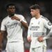 Aurelien Tchouameni and Federico Valverde of Real Madrid look on during the LaLiga EA Sports match between Real Madrid CF and Girona FC (Photo by Denis Doyle/Getty Images)