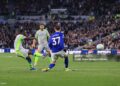 Jeremy Doku of Manchester City scores their 1st goal during the Premier League match between Everton and Manchester City (Photo by Simon Stacpoole/Offside/Offside via Getty Images)
