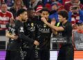 Paris Saint-Germain's French forward #10 Ousmane Dembele (2L) celebrates scoring his team's first goal with team mates during the UEFA Champions League second-leg, semi-final football match between FC Bayern Munich and Paris Saint-Germain (PSG) (Photo by FRANCK FIFE / AFP via Getty Images)
