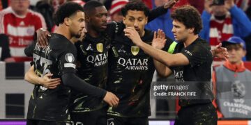 Paris Saint-Germain's French forward #10 Ousmane Dembele (2L) celebrates scoring his team's first goal with team mates during the UEFA Champions League second-leg, semi-final football match between FC Bayern Munich and Paris Saint-Germain (PSG) (Photo by FRANCK FIFE / AFP via Getty Images)