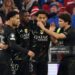 Paris Saint-Germain's French forward #10 Ousmane Dembele (2L) celebrates scoring his team's first goal with team mates during the UEFA Champions League second-leg, semi-final football match between FC Bayern Munich and Paris Saint-Germain (PSG) (Photo by FRANCK FIFE / AFP via Getty Images)