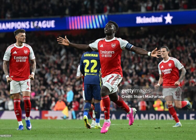 Bukayo Saka of Arsenal celebrates scoring his team's first goal during the UEFA Champions League 2025/26 Semi Final Second Leg match between Arsenal FC and Atletico de Madrid (Photo by Stuart MacFarlane/Arsenal FC via Getty Images)
