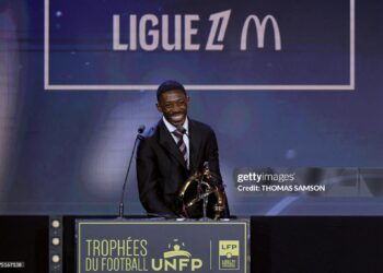 Paris Saint-Germain's French forward #10 Ousmane Dembele receives the Ligue 1 best player award during the 34th UNFP's (France's professional players union) French football awards (Photo by Thomas SAMSON / AFP via Getty Images)