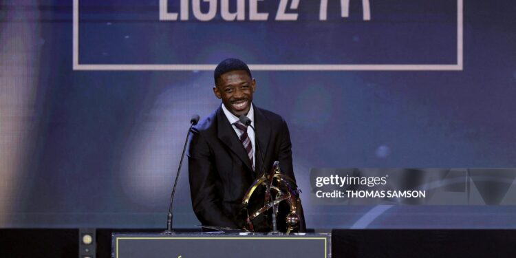 Paris Saint-Germain's French forward #10 Ousmane Dembele receives the Ligue 1 best player award during the 34th UNFP's (France's professional players union) French football awards (Photo by Thomas SAMSON / AFP via Getty Images)