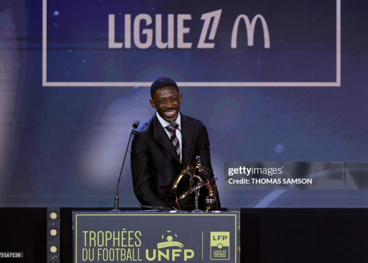 Paris Saint-Germain's French forward #10 Ousmane Dembele receives the Ligue 1 best player award during the 34th UNFP's (France's professional players union) French football awards (Photo by Thomas SAMSON / AFP via Getty Images)