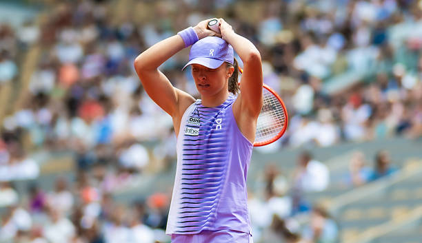 Iga Swiatek of Poland in action against Marta Kostyuk of Ukraine in the fourth round on Day Eight of the 2026 French Open at Roland Garros on May 31, 2026 in Paris, France (Photo by Robert Prange/Getty Images)