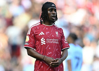 Liverpool's Dutch defender #30 Jeremie Frimpong looks on during the English Premier League football match between Liverpool and Brentford at Anfield in Liverpool, north west England on May 24, 2026. (Photo by Paul ELLIS / AFP via Getty Images) / RESTRICTED TO EDITORIAL USE. No use with unauthorized audio, video, data, fixture lists, club/league logos or 'live' services. Online in-match use limited to 120 images. An additional 40 images may be used in extra time. No video emulation. Social media in-match use limited to 120 images. An additional 40 images may be used in extra time. No use in betting publications, games or single club/league/player publications. /