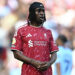 Liverpool's Dutch defender #30 Jeremie Frimpong looks on during the English Premier League football match between Liverpool and Brentford at Anfield in Liverpool, north west England on May 24, 2026. (Photo by Paul ELLIS / AFP via Getty Images) / RESTRICTED TO EDITORIAL USE. No use with unauthorized audio, video, data, fixture lists, club/league logos or 'live' services. Online in-match use limited to 120 images. An additional 40 images may be used in extra time. No video emulation. Social media in-match use limited to 120 images. An additional 40 images may be used in extra time. No use in betting publications, games or single club/league/player publications. /