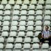 A Juventus' supporter waits for the match to restart after a suspension during the Italian Serie A football match between Torino and Juventus at the Olympic Grande Torino stadium in Turin on May 24, 2026. (Photo by MARCO BERTORELLO / AFP via Getty Images)