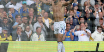 Dominic Calvert-Lewin of Leeds United celebrates scoring his team's first goal during the Premier League match between Leeds United and Brighton & Hove Albion at Elland Road on May 17, 2026 in Leeds, England. (Photo by Nathan Stirk/Getty Images)
