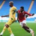 Jordan Ayew (left) in action against Wales Photo Courtesy: GFA