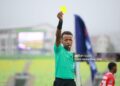 Referee Omar Abdulkadir Artan shows yellow card during the FIFA U-20 World Cup Chile 2025 Group B match between Panama and Korea Republic (Photo by Hector Vivas - FIFA/FIFA via Getty Images)