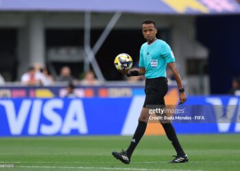 Referee Omar Artan holds the match ball during the FIFA U-20 World Cup Chile 2025 third place match between Colombia and France (Photo by Buda Mendes - FIFA/FIFA via Getty Images)