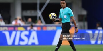Referee Omar Artan holds the match ball during the FIFA U-20 World Cup Chile 2025 third place match between Colombia and France (Photo by Buda Mendes - FIFA/FIFA via Getty Images)