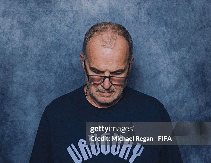 (EDITOR'S NOTE: This image has been digitally altered.) Marcelo Bielsa, Head Coach of Uruguay, poses for a portrait during the official FIFA World Cup 2026 portrait session on June 10, 2026 in Cancun, Mexico. (Photo by Michael Regan - FIFA/FIFA via Getty Images)