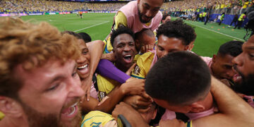 Gabriel Martinelli #22 of Brazil celebrates with teammates after scoring the team's second goal during the FIFA World Cup 2026 Round Of 32 match between Brazil and Japan at Houston Stadium on June 29, 2026 in Houston, Texas. (Photo by Lars Baron/Getty Images)