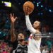 Jalen Brunson #11 of the New York Knicks shoots the ball against Stephon Castle #5 of the San Antonio Spurs during the fourth quarter in Game One of the 2026 NBA Finals (Photo by Gregory Shamus/Getty Images)