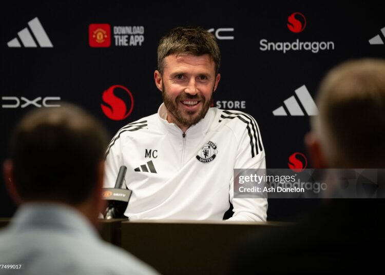 Head Coach Michael Carrick of Manchester United speaks during a press conference at Carrington Training Ground (Photo by Ash Donelon/Manchester United via Getty Images)