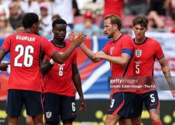 Harry Kane #9 of England celebrates with teammate Jarell Quansah after scoring his team's first goal during the international friendly match between England and New Zealand (Photo by Eddie Keogh - The FA/The FA via Getty Images)