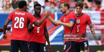 Harry Kane #9 of England celebrates with teammate Jarell Quansah after scoring his team's first goal during the international friendly match between England and New Zealand (Photo by Eddie Keogh - The FA/The FA via Getty Images)