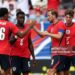 Harry Kane #9 of England celebrates with teammate Jarell Quansah after scoring his team's first goal during the international friendly match between England and New Zealand (Photo by Eddie Keogh - The FA/The FA via Getty Images)