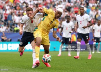 FOXBOROUGH, MASSACHUSETTS - JUNE 23: Jordan Ayew #9 of Ghana controls the ball against Elliot Anderson #8 of England during the FIFA World Cup 2026 Group L match between England and Ghana at Boston Stadium on June 23, 2026 in Foxborough, Massachusetts. (Photo by Maddie Meyer - FIFA/FIFA via Getty Images)