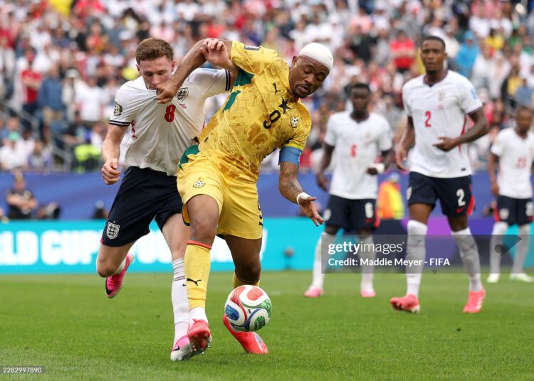 FOXBOROUGH, MASSACHUSETTS - JUNE 23: Jordan Ayew #9 of Ghana controls the ball against Elliot Anderson #8 of England during the FIFA World Cup 2026 Group L match between England and Ghana at Boston Stadium on June 23, 2026 in Foxborough, Massachusetts. (Photo by Maddie Meyer - FIFA/FIFA via Getty Images)