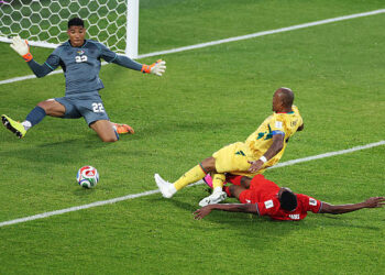 TORONTO, ONTARIO - JUNE 17: Jordan Ayew #9 of Ghana attempts to shoot while Jiovany Ramos #13 of Panama blocks during the FIFA World Cup 2026 Group L match between Ghana and Panama at Toronto Stadium on June 17, 2026 in Toronto, Ontario. (Photo by Dan Mullan/Getty Images)