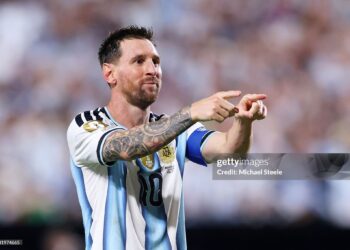 KANSAS CITY, MISSOURI - JUNE 16: Lionel Messi #10 of Argentina celebrates scoring his team's third and hat trick goal during the FIFA World Cup 2026 Group J match between Argentina and Algeria at Kansas City Stadium on June 16, 2026 in Kansas City, Missouri. (Photo by Michael Steele/Getty Images)