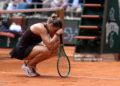 Aryna Sabalenka reacts as she plays against Diana Shnaider during their women's quarter final singles match on day 11 of the French Open tennis tournament (Photo by Thomas SAMSON / AFP via Getty Images)