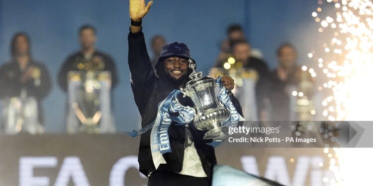 Manchester City's Antoine Semenyo with the FA Cup trophy during The After Party at Co-op Live after a parade in Manchester to celebrate the achievements of the Manchester City men's and women's teams this season. Picture date: Monday May 25, 2026. (Photo by Nick Potts/PA Images via Getty Images)