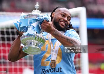 Antoine Semenyo of Manchester City celebrates with the trophy during the Emirates FA Cup Final match between Chelsea and Manchester City (Photo by Marc Atkins/Getty Images)